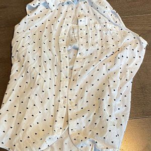 A white and black heart crop top shirt